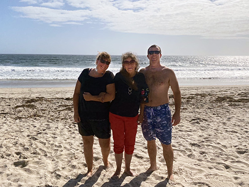 While receiving hospice from Care Dimensions, Bonnie Landry (center) enjoyed a "bucket list" trip to Hampton Beach, NH, with her family.