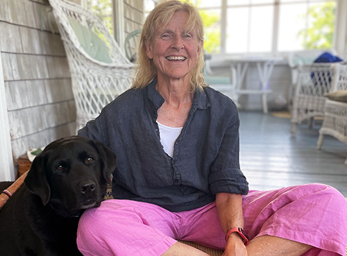 Care Dimensions volunteer Jan Lindsay and her dog, Rufus, share a relaxing moment. They regularly visit patients and families at the Kaplan Family Hospice House.