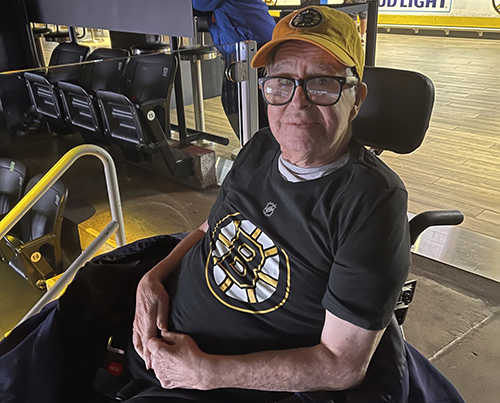 Dennis Lagerblade, who receives hospice in a group home, attended a Boston Bruins game, courtesy of the Care Dimensions Family Fund.