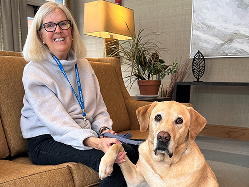 Care Dimensions volunteer Nancy Donaldson with her dog Wilson.