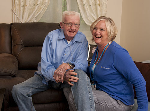 Care Dimensions Social Worker Angela Swift shares a laugh with hospice patient Ken “Woody” Wooldridge.