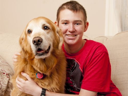 Kyle with pet volunteer Patrick