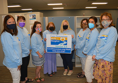 Amy Rein, special events manager, left, joins Walk team S&P's Heart and Soul to celebrate the 34th Walk for Hospice.