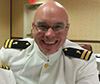 Care-Dimensions-hospice-chaplain-Jay-Libby-in-Navy-uniform