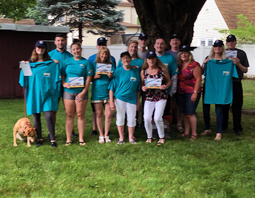 Members of the Crowley family promote the Care Dimensions Walk for Hospice, which they support in memory of James Crowley of Malden, MA.