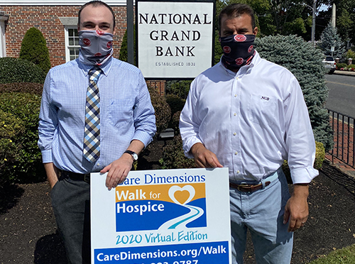 Paddy Morris and Matt Martin show National Grand Bank's support for the Care Dimensions Walk for Hospice.