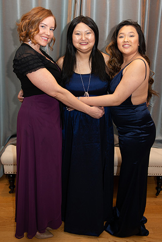 Care Dimensions hospice patient Eliza at prom-birthday event with cousin and sister