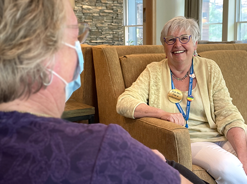 Susan Phillips volunteers at the Care Dimensions Hospice House, where she interacts with patients and their family members.