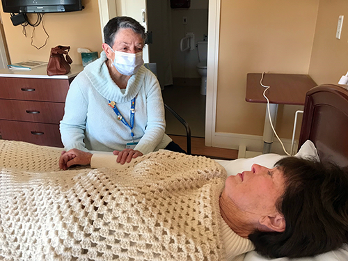 Care Dimensions volunteer Trish Cannon offers a comforting presence to hospice patients.