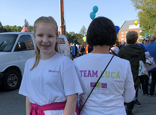 At the 2018 Care Dimensions Walk for Hospice, members of Team Luca wore their vintage shirts. At this year’s Walk, they’ll wear shirts designed by Madeline Luca's great-granddaughter Paige (left).