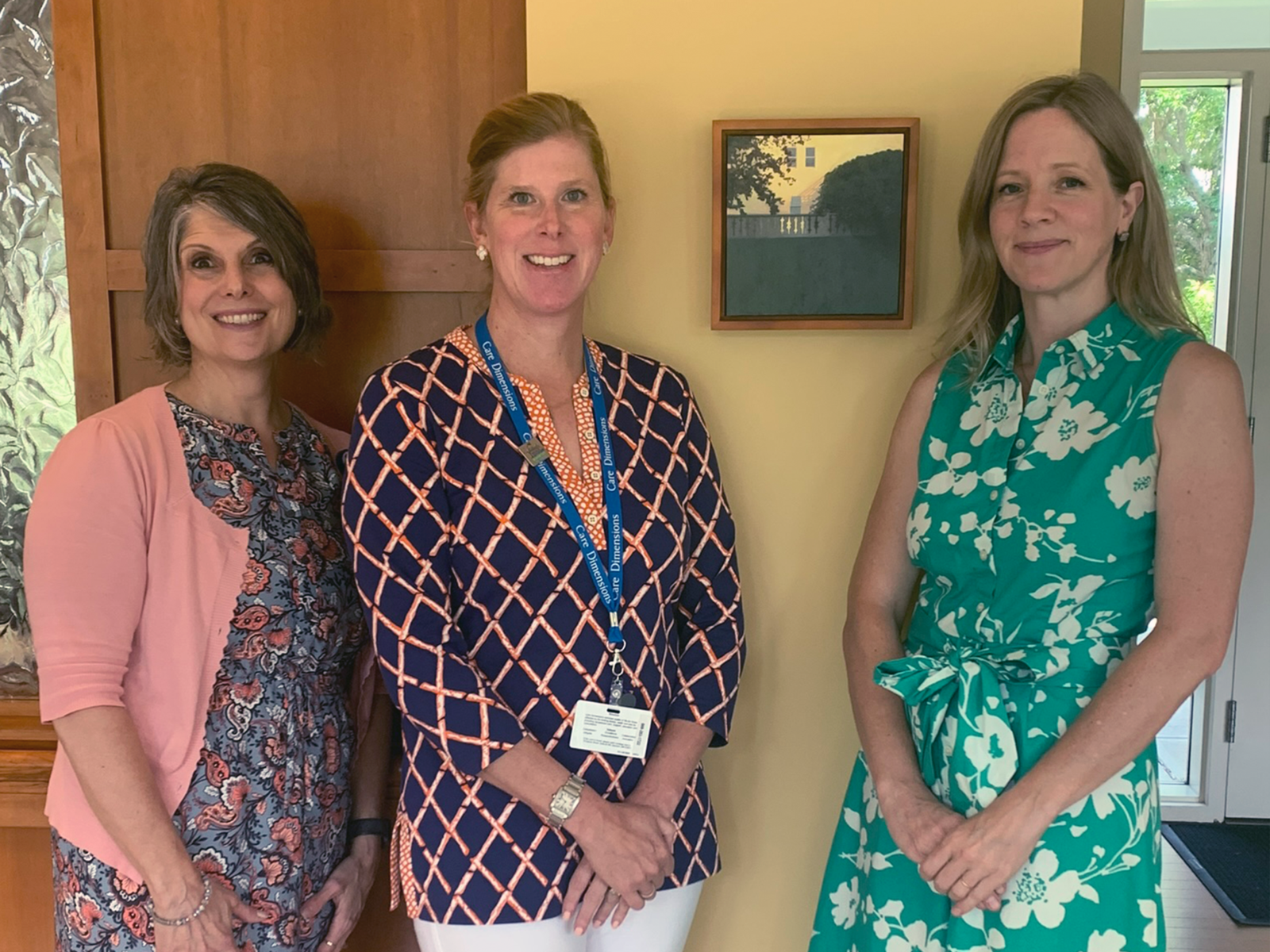 Care Dimensions Chief Clinical Officer Patty Ramsden alongside volunteer Nancy Lemons and Ginny Williams.