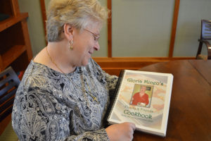 Susan Mineo with mother Gloria Mineo cookbook