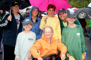 Members of Team Boutchie surround "Meme" during the 2008 Walk for Hospice.