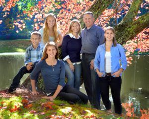 Brian Morissette (left) poses for a portrait with his family in the fall of 2014. His mom, Theresa (center), died from cancer the following year.