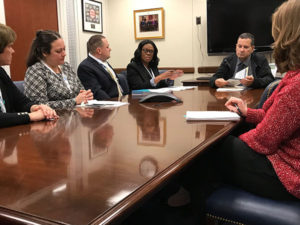 Care Dimensions Clinical Director Florence Exantus advocates for hospice in meeting with Massachusetts hospice supporters and Susannah Savage assistant to U.S. Senator Elizabeth Warren