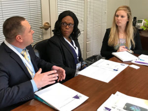 Care Dimensions Clinical Directors Matthew Smith and Florence Exantus advocate for hospice in a meeting with Nikki Hurt, legislative assistant to U.S. Sen. Edward Markey.