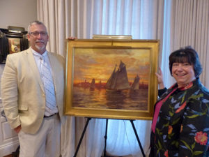 Artist Ken Knowles of Rockport, MA, with Care Dimensions President Pat Ahern and the painting Ken is donating to the Care Dimensions 40th Anniversary Gala