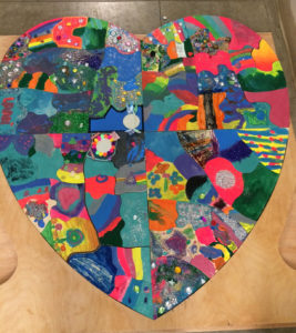 heart-shaped-puzzle-made-by-grieving-children-at-Care-Dimensions-Camp-Stepping-Stones-grief-support-camp